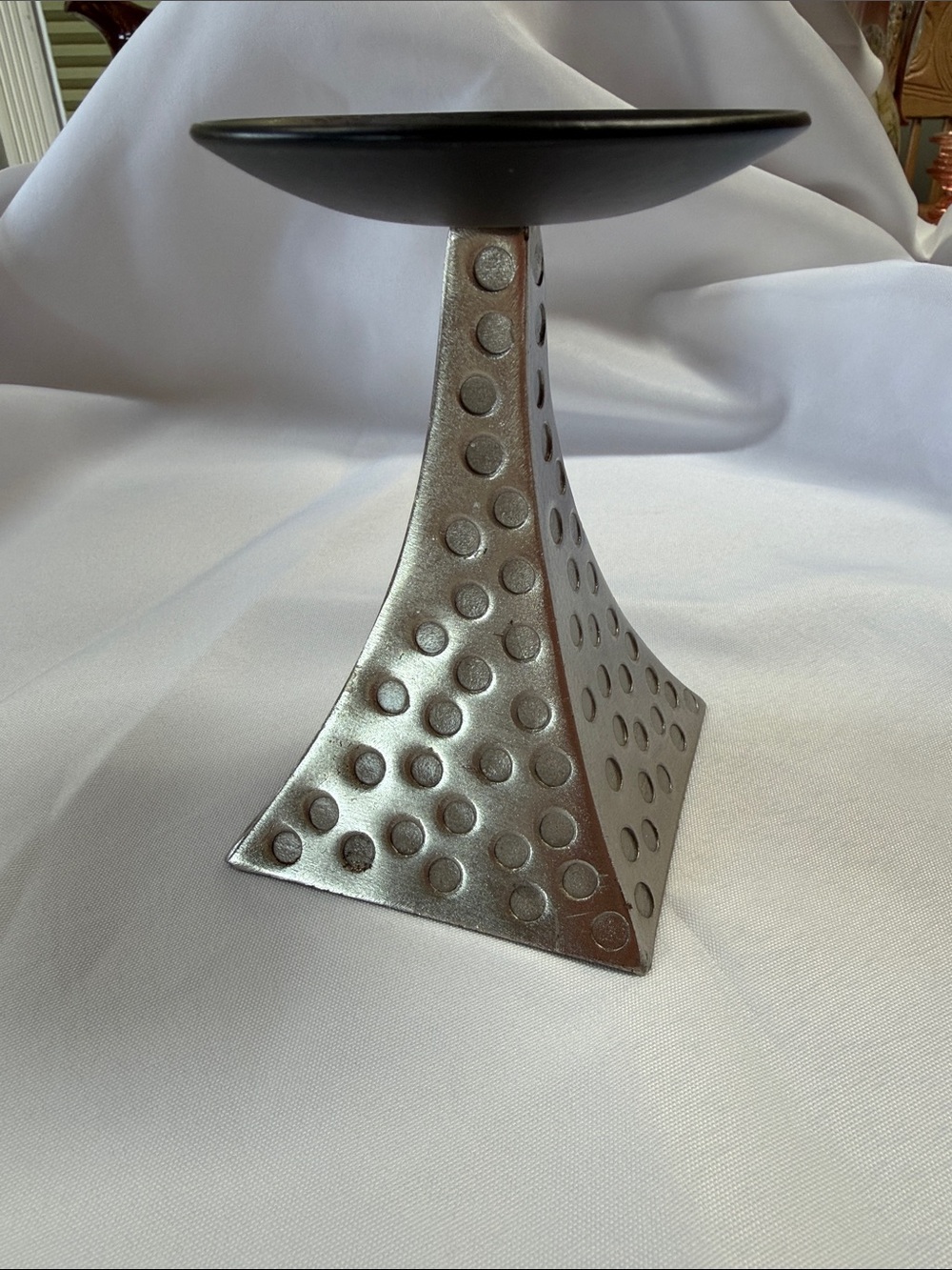 Pier 1 vintage silver and black candlestick. Good condition. Approximately 5”.